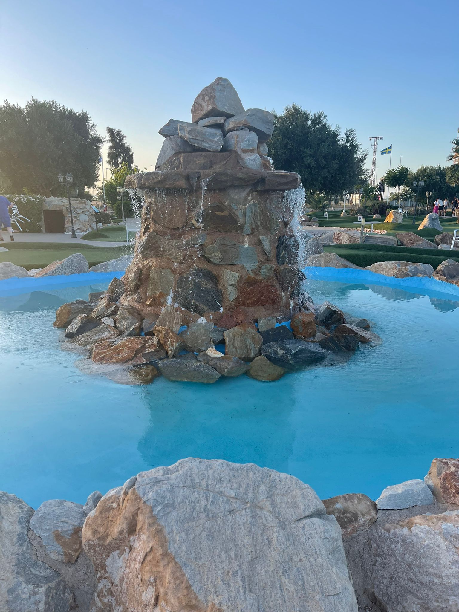 Players on the adventure golf course at Golf Delux, Los Alcázares